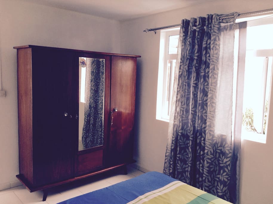 Bedroom with cupboard with plenty of sunshine!