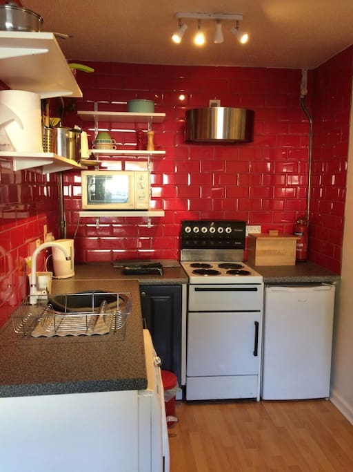 A fully equipped kitchen ...