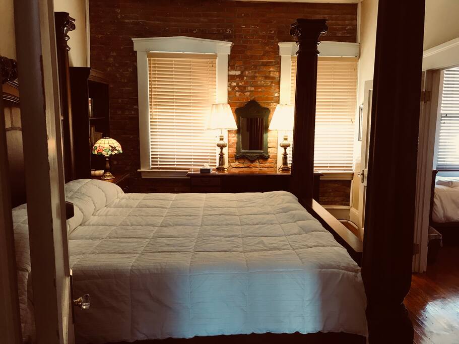 King poster bed with luxurious down comforter