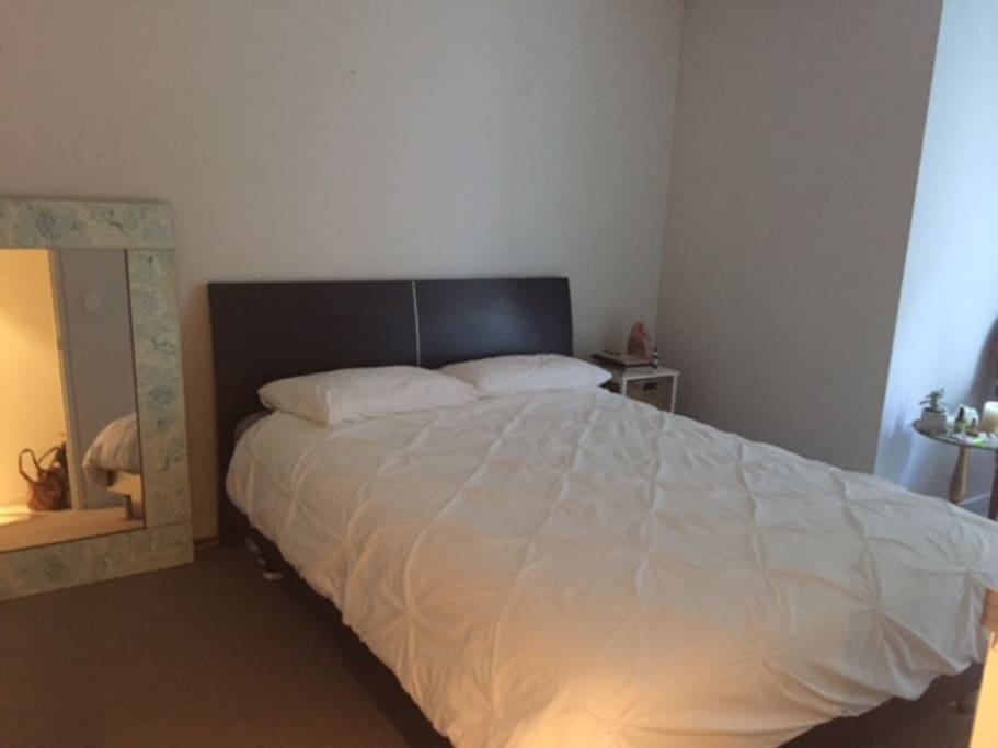 Queen size bedroom with built in wardrobe