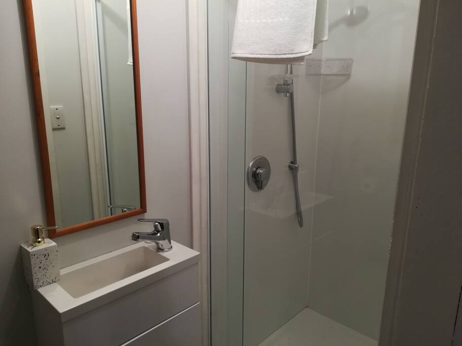 En suite has toilet and shower
