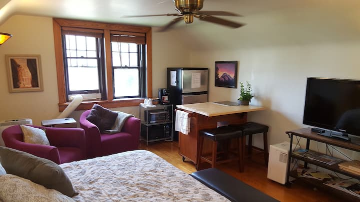 The studio is well-equipped with everything a hotel room would offer and more, including a full-size fridge-freezer, large cable HD TV, coffee maker, microwave, and toaster oven