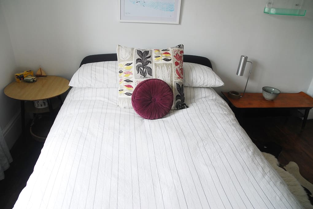A comfy double bed awaits.