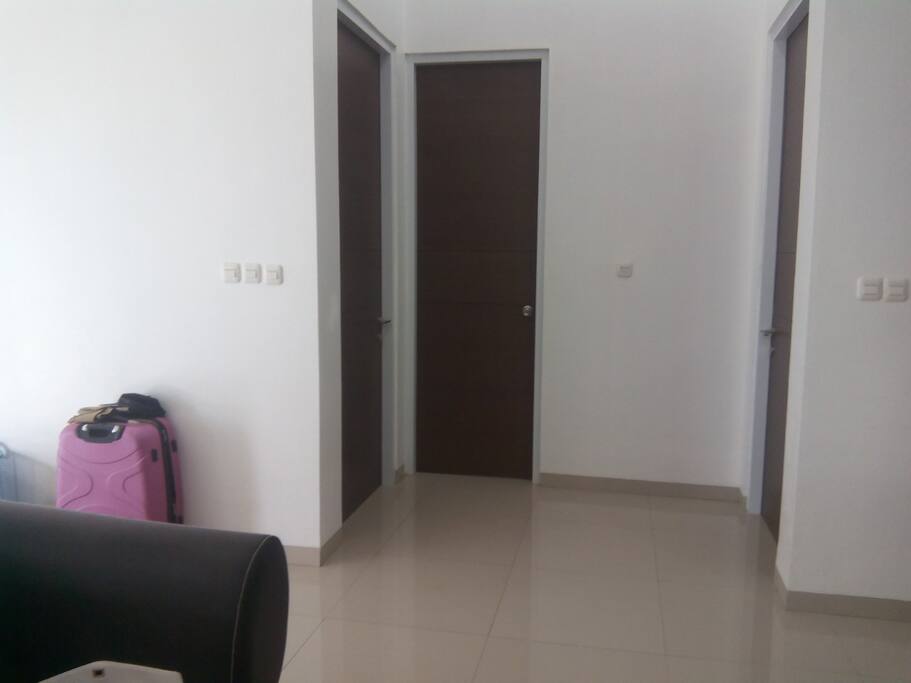 The left one is the master room, my folk's bedroom, the middle is the bathroom and the right one is the bedroom you will sleep in.