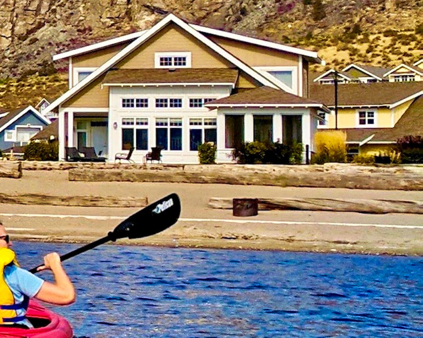 View of the Beach House Osoyoos from the lake. Kayaks for you to use too!