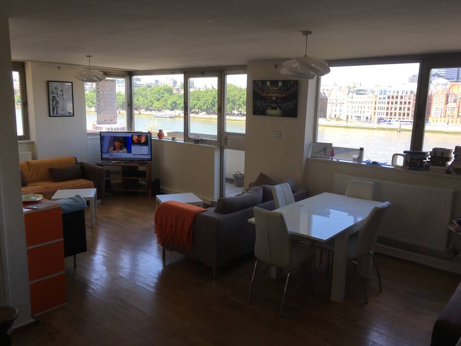 The living room and door to the balcony. VirginMedia TV and broadband available for your use