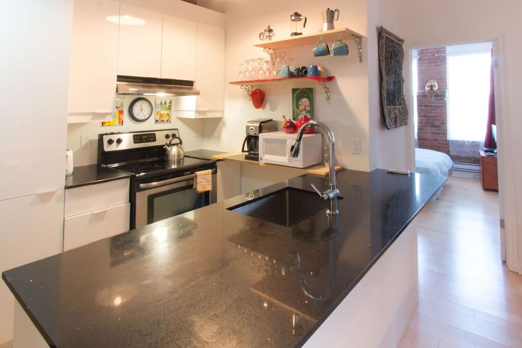 Well-stocked kitchen, with breakfast and cooking goods, like rice, bread and pasta.