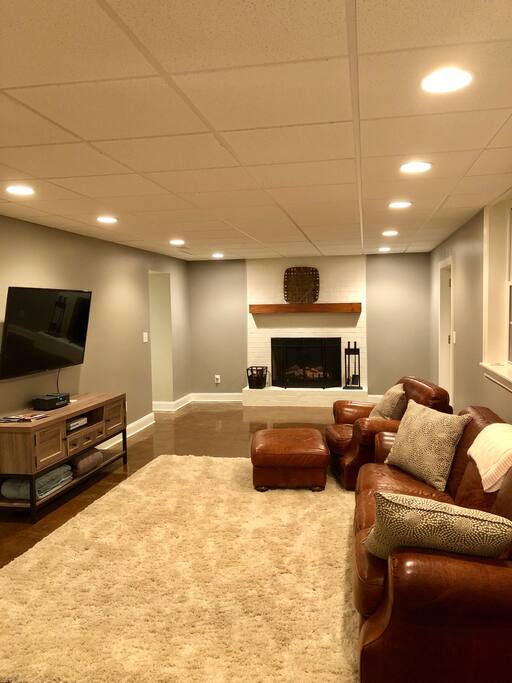 Relax in front of the fireplace on our leather couch!