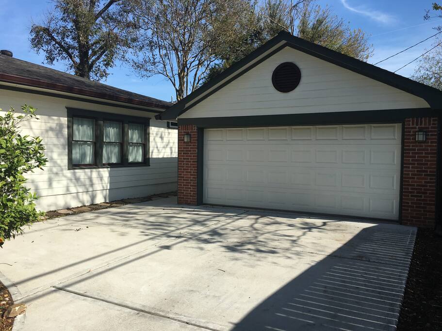Two car garage and gated parking area