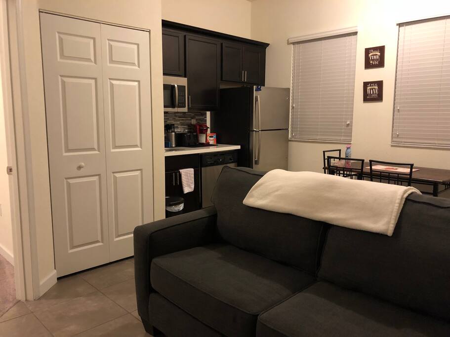 Small kitchen. Dishwasher. Microwave. Fridge and Dining table (sits 4) . Pull out Sofa bed.