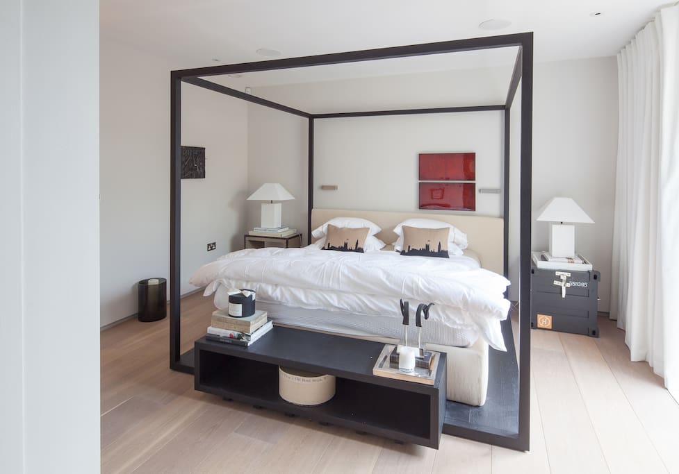 Wonderful contemporary space with luxury bed and linens.