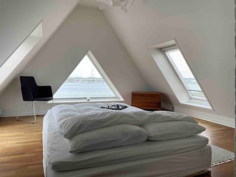 Room with a front-row view of the Houget