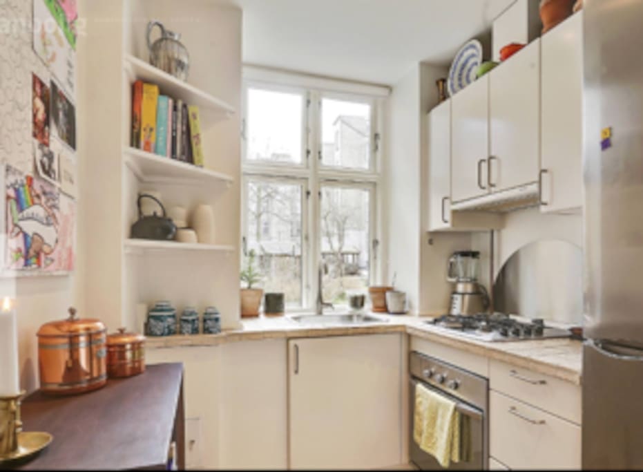 small kitchen. You can put your grocery in the fridge and you can cook your food.