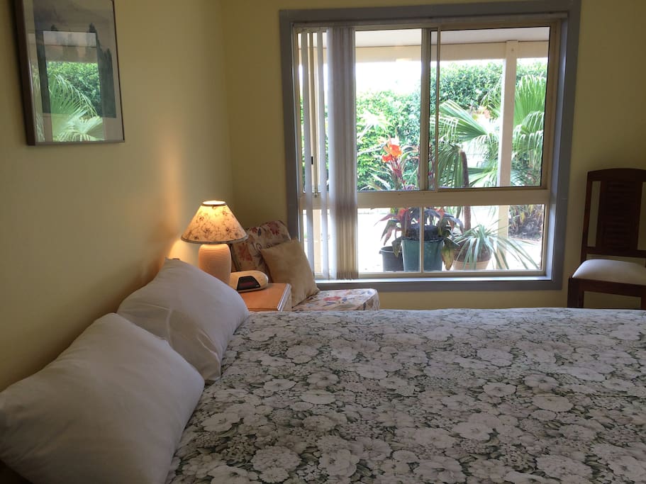 Second bedroom. Private leafy courtyard view.