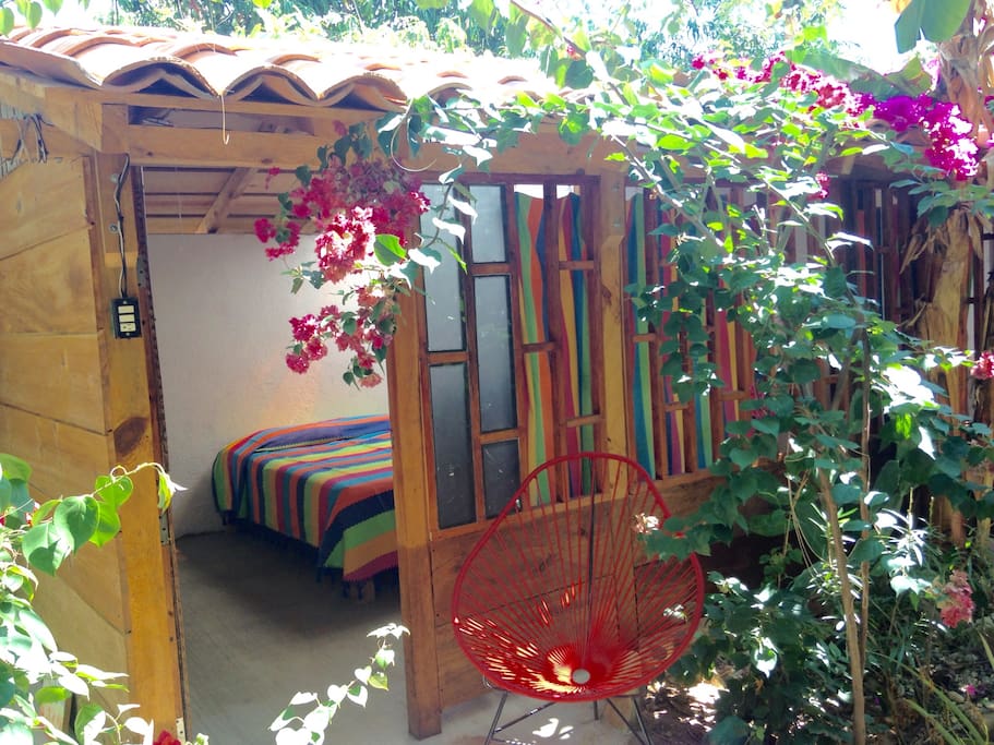 Enjoy our garden relaxing in this cabaña
