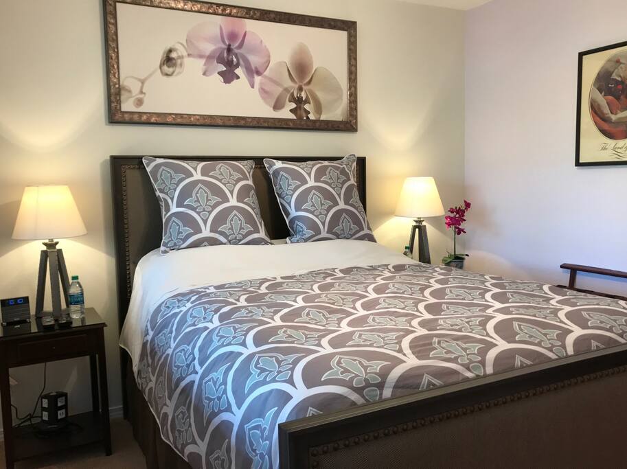 The Nordic Suite has luxurious bedding and view of Willow Tree.