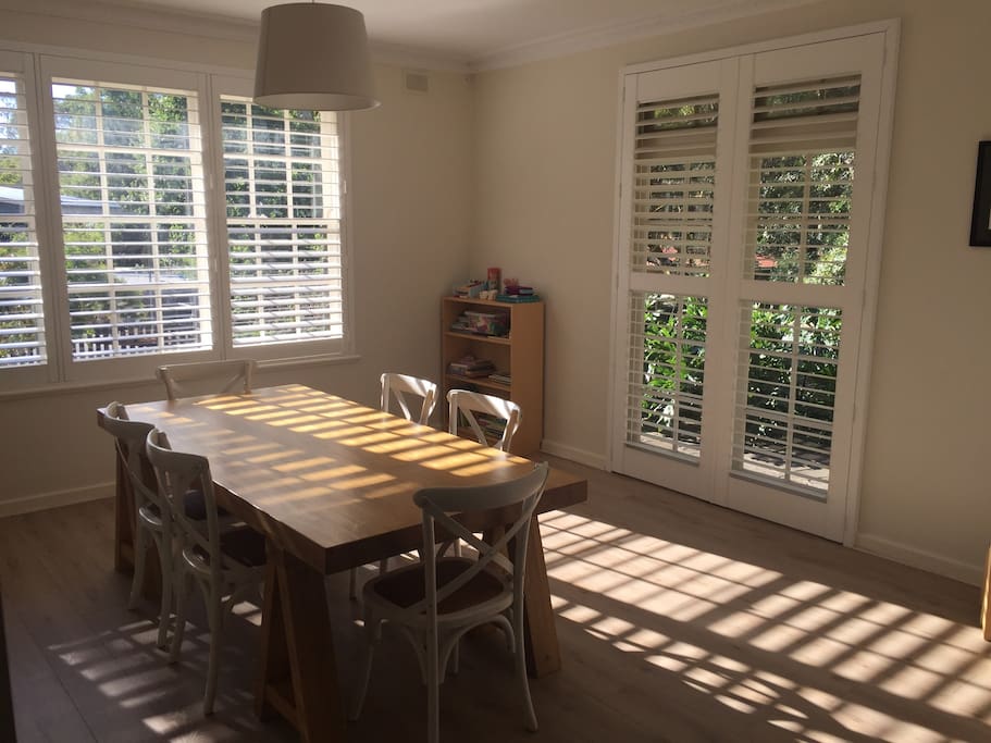 Our sun drenched dining room. We have enough chairs to seat 8.