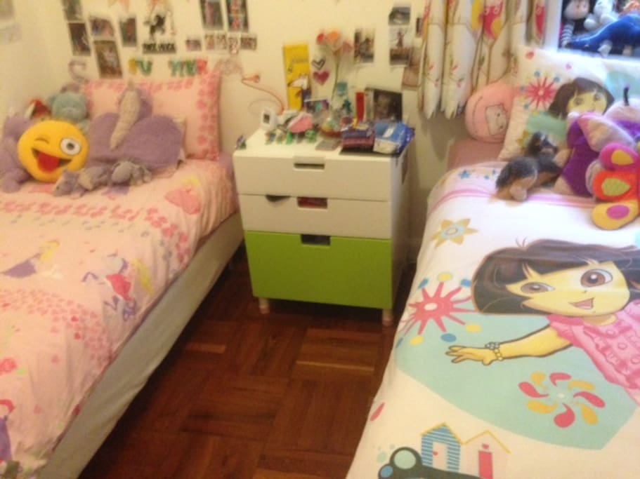 Kids bedroom, 2 x king singles, with 1 rollaway bed under the king single.