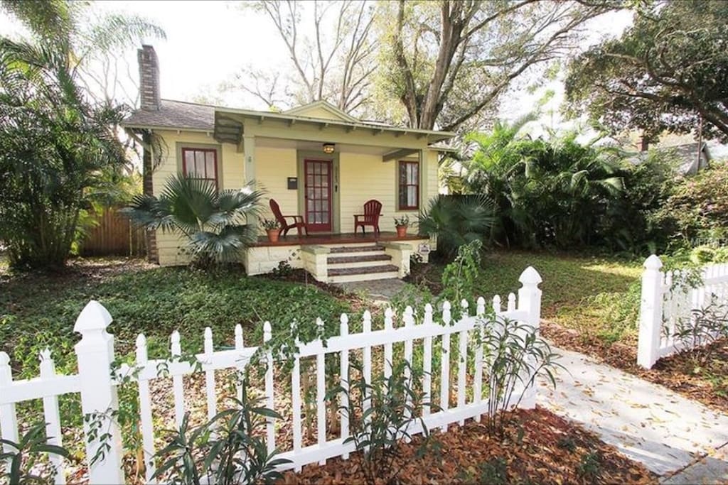 Our bungalow. Your bedroom window is the front right. There is free street parking in front of it. Our front porch and back porch are great for relaxing and reading a book or having a drink.