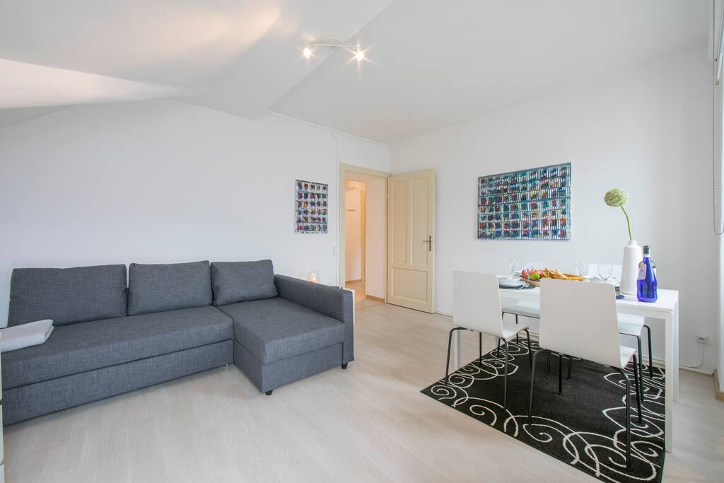 Livingroom with sofa bed and table