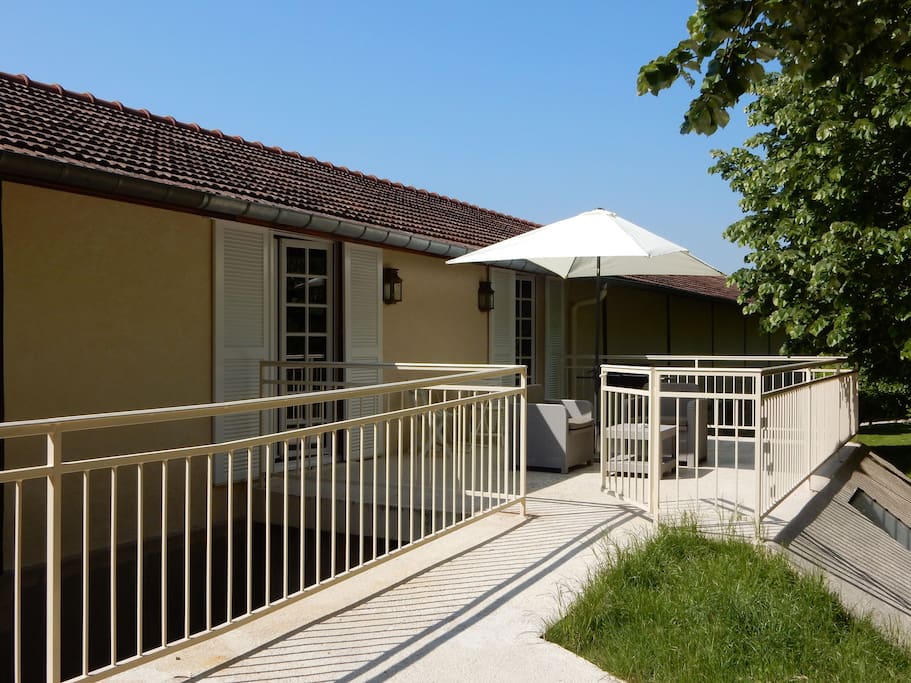 Backside terrace with access by wheelchair