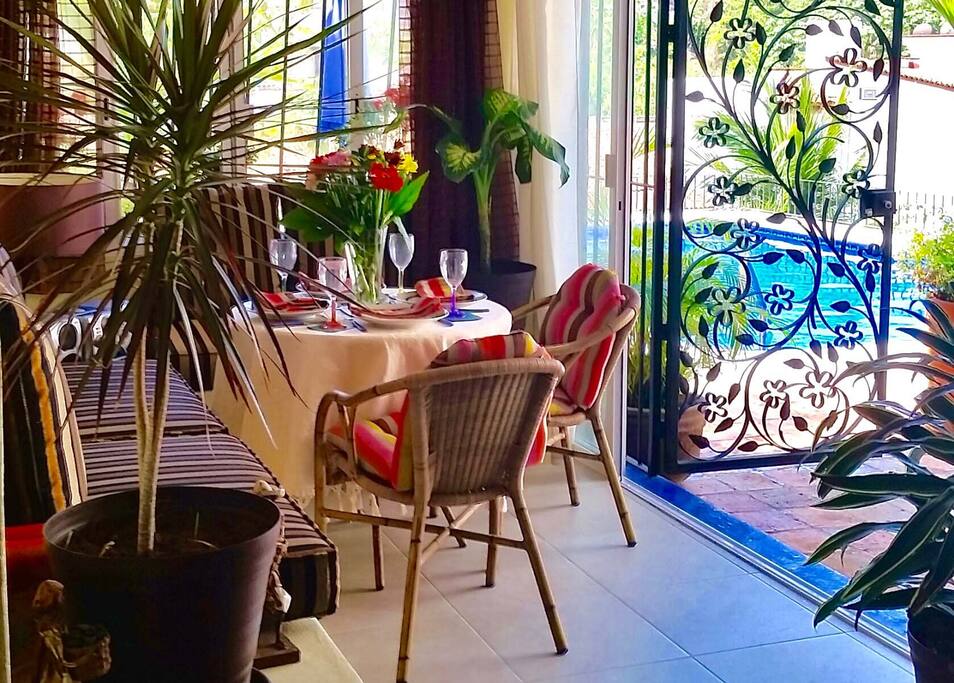 Terrace/Dining Room opens directly on to the patio and pool area... no stairs!