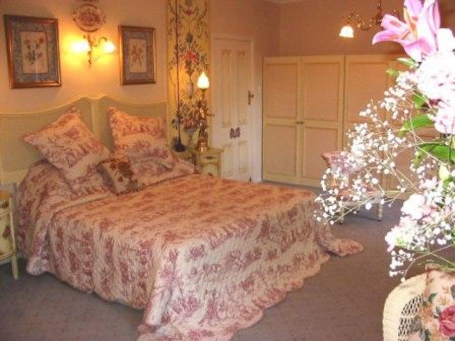 Beautiful king size bed in a spacious room