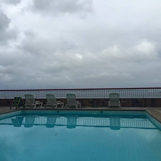 Upstairs pool - down the pier there are 2 more. 1 adult 1 kid. Also area where the breakfast is served in the morning