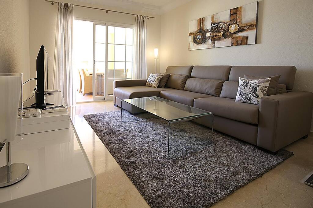 Contemporary and comfortable lounge with access to the terrace
