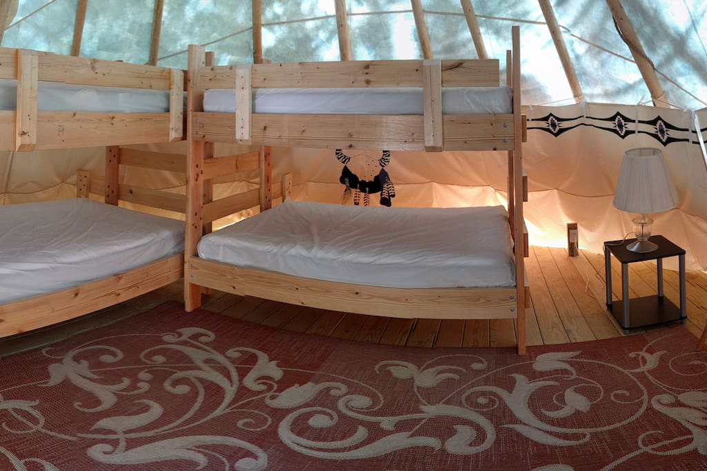 Camp with real mattresses! 2 double beds under 2 single overhead beds to comfortably sleep 6.