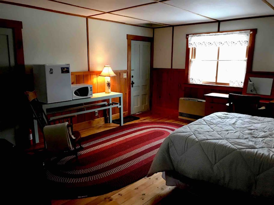 The apartment has views of Cottrill's Cove along the Damariscotta River. Renters control the heat in the studio with a Rinnai heater. There is a mini-fridge, microwave, and closet space.