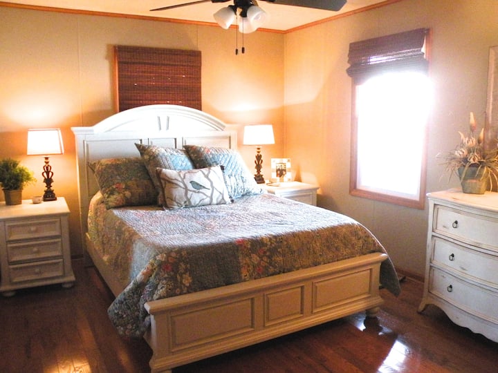Master bedroom has a lake view right from your bed.