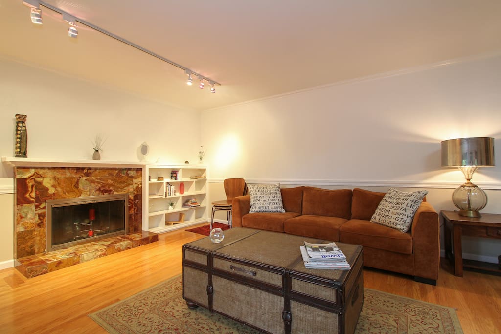 Living room. Two sofas, lots of light, unstuffy, and breezy.