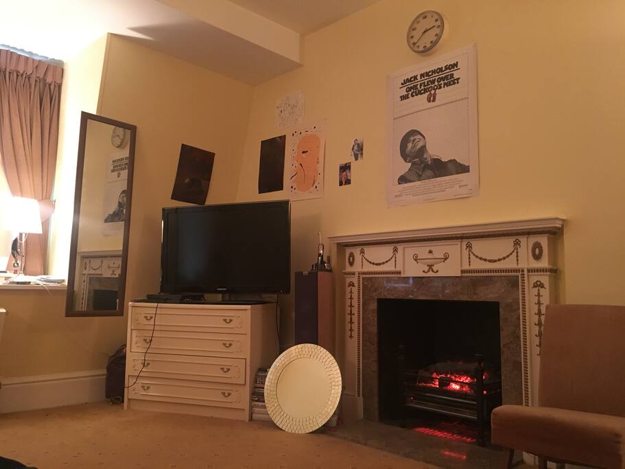 Bedroom fireplace and TV