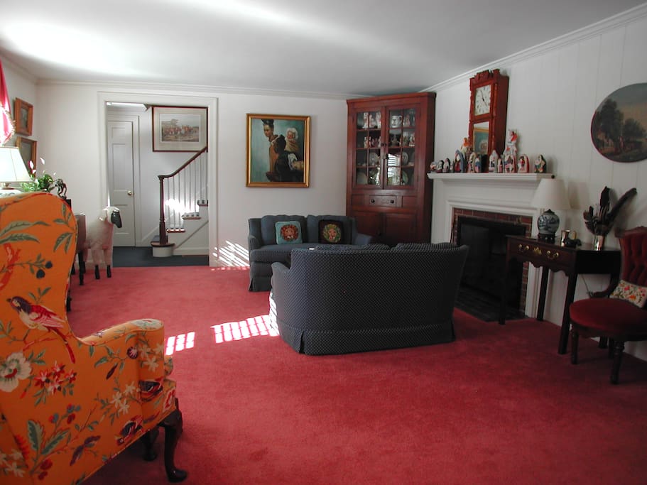 Living room showing stairs to 2nd floor bedrooms