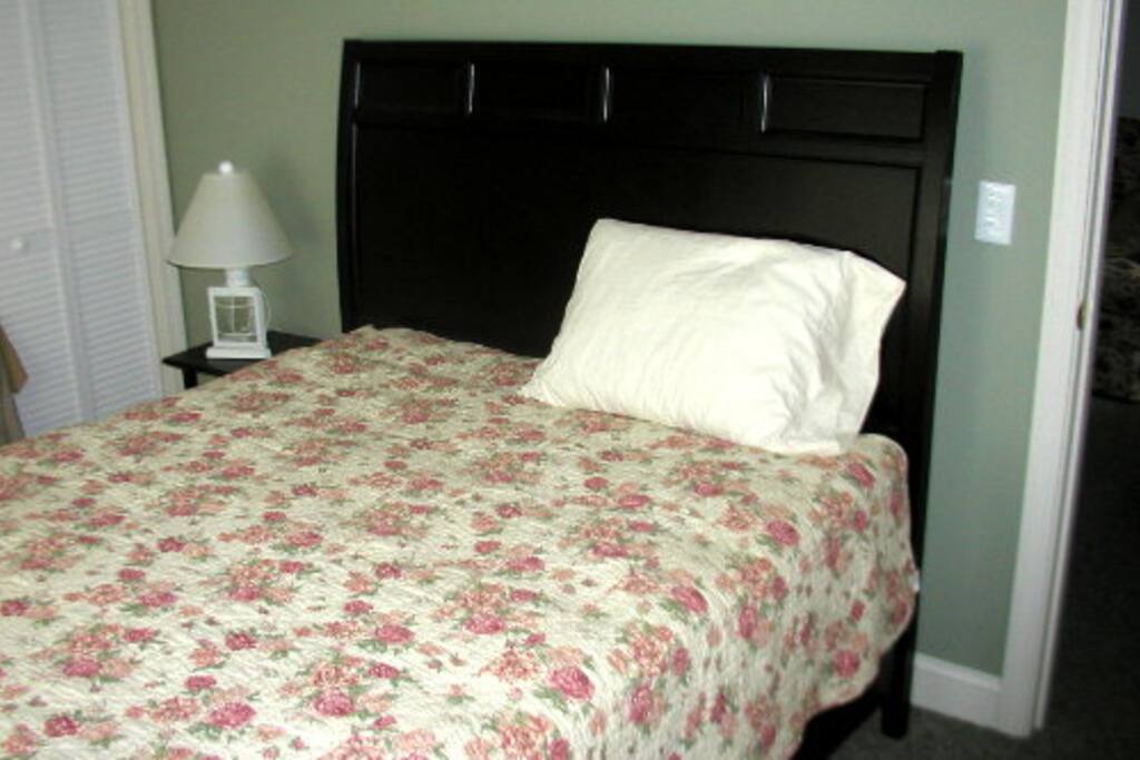 Bedroom - double bed, night stand, and closet