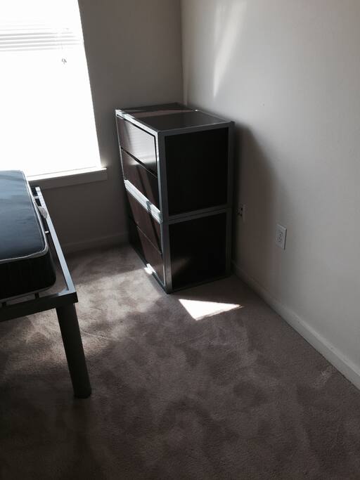 dressers can fit under bed to allow for more space in room.