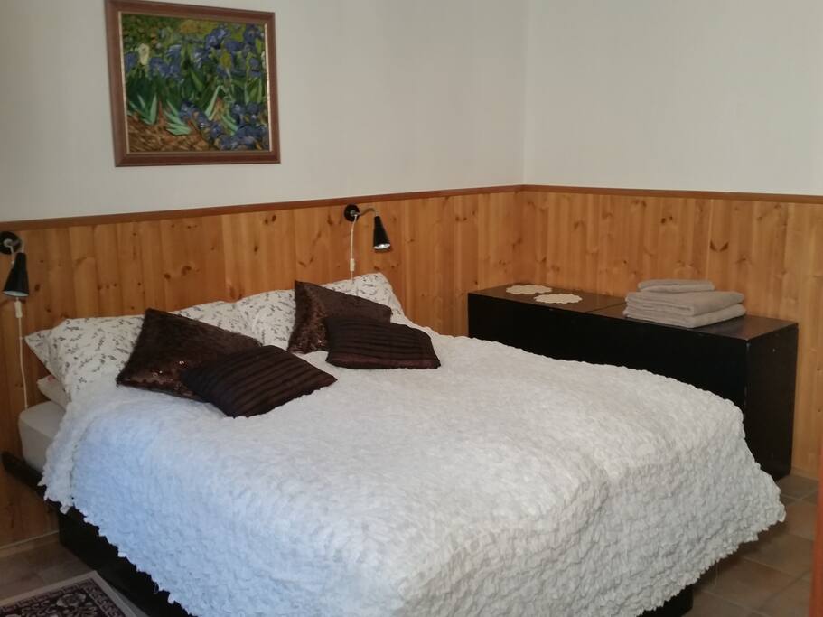Comfortable double bed in spaceous bedroom