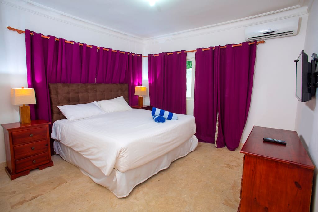 Your new bedroom with a full-king-size bed, nice dresser and night tables with lamps, it is made for your comfort and enjoyable vacation.
