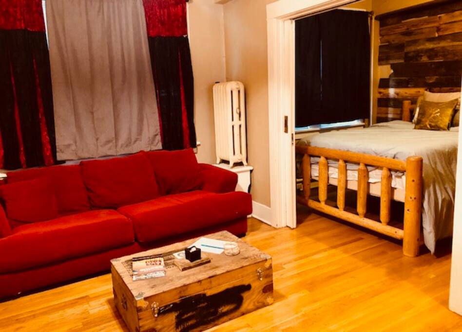 Rustic living area with repurposed objects and natural materials