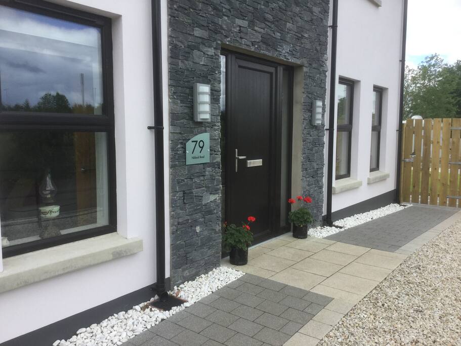 We will greet our guests warmly at the door of our newly constructed home.