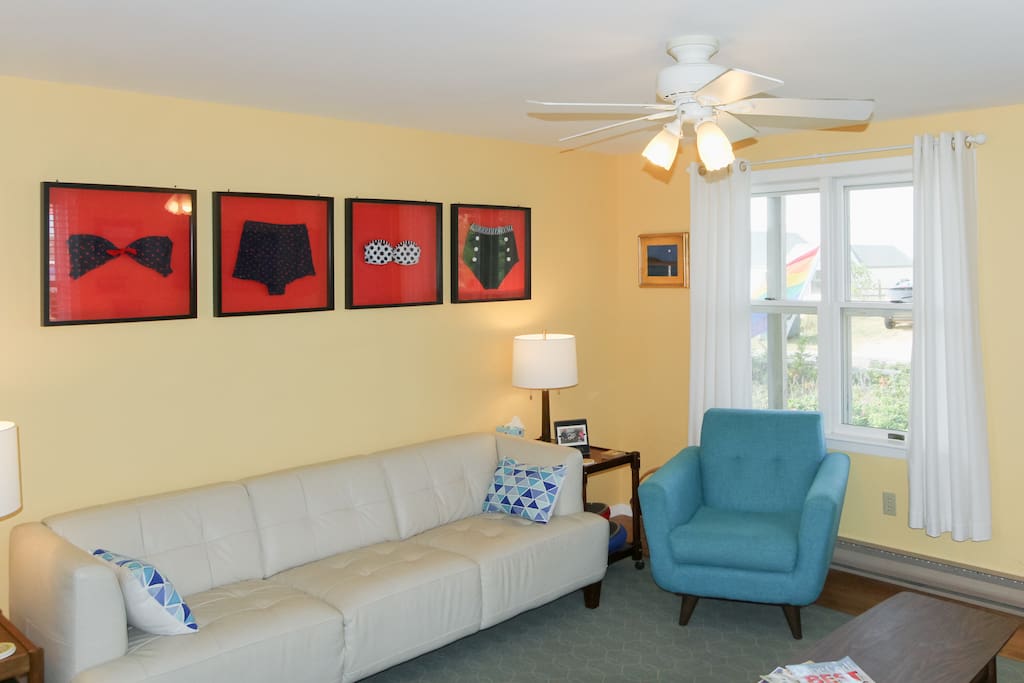 Artful décor and furnishings outfit the comfortable living room.