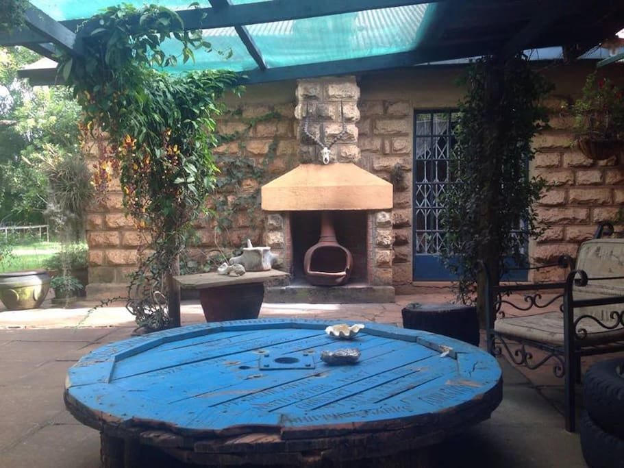 DRINKS AREA WITH OUTSIDE FIREPLACE