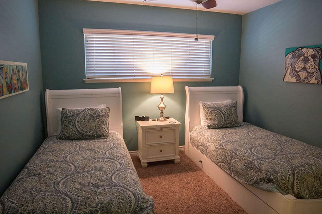 Two queen beds in "kids bedroom"