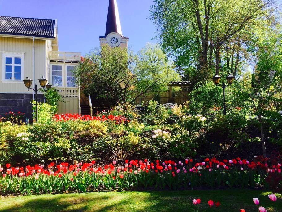 Garden with town church as nearest neighbour.
