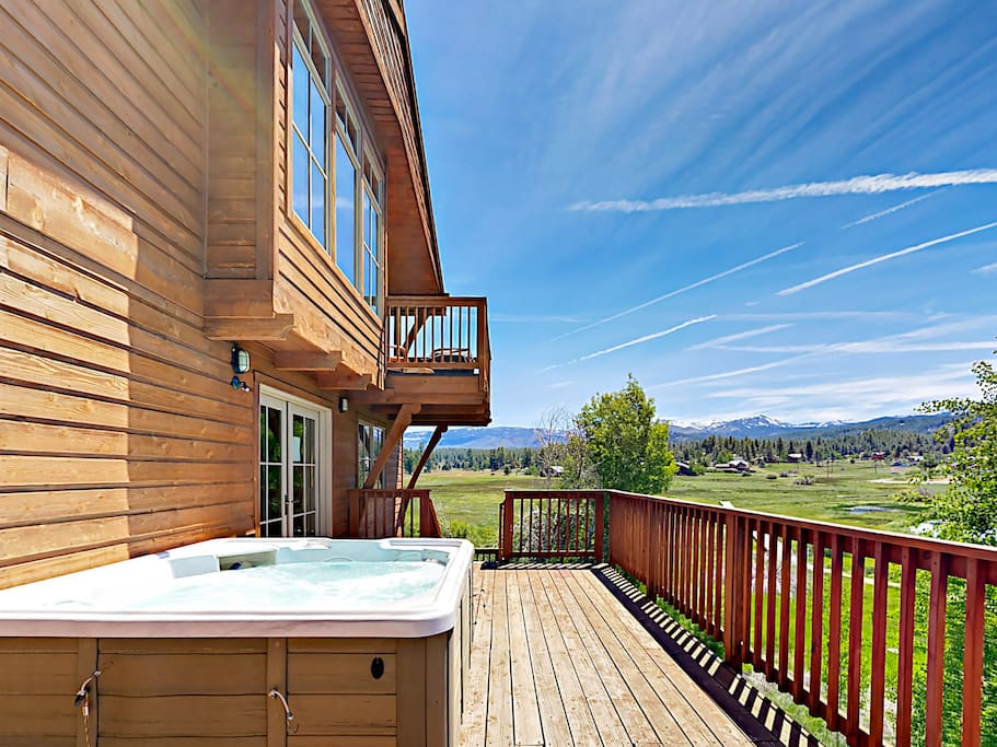Welcome to Truckee! Soak in the hot tub overlooking the beautiful scenery.