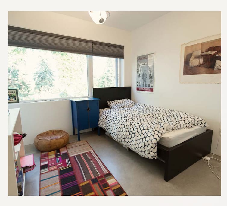 Bedroom with single twin bed.