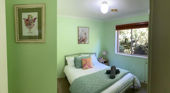 Bright and breezy bedroom with double bed and sliding door built in  wardrobe