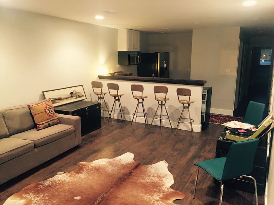 Open kitchen and bar with seating