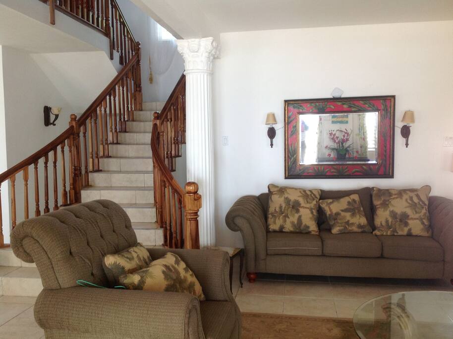Part of the open plan living off a large veranda looking out to sea